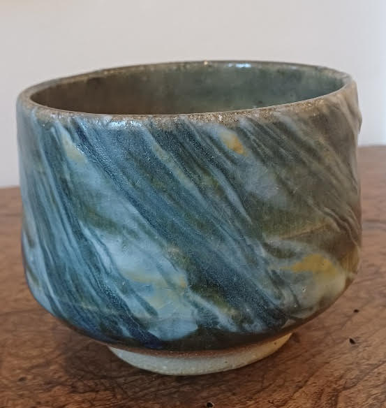 Small tea bowl with blue and green glazes by Ray Toms